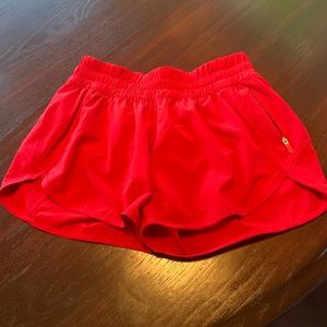 Red Lululemon tracker shorts